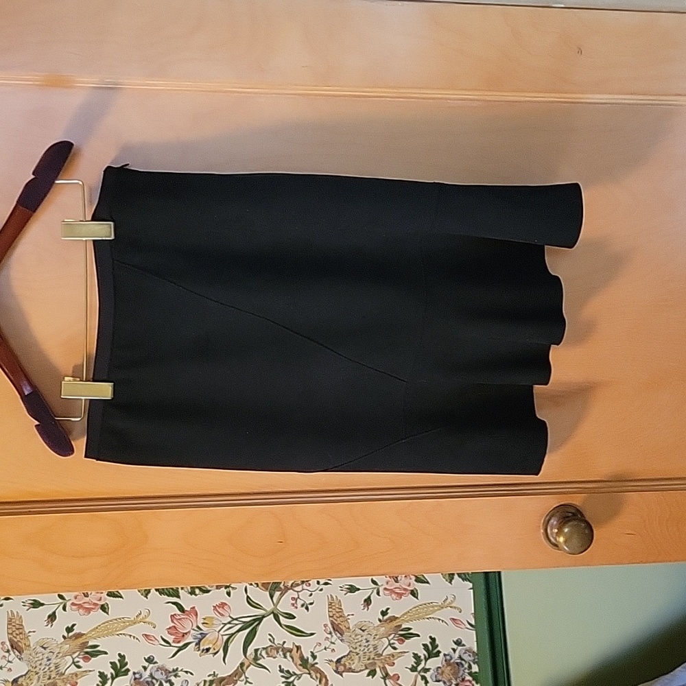 T Tahari black bias-cut skirt with deep flounce hem. Size M